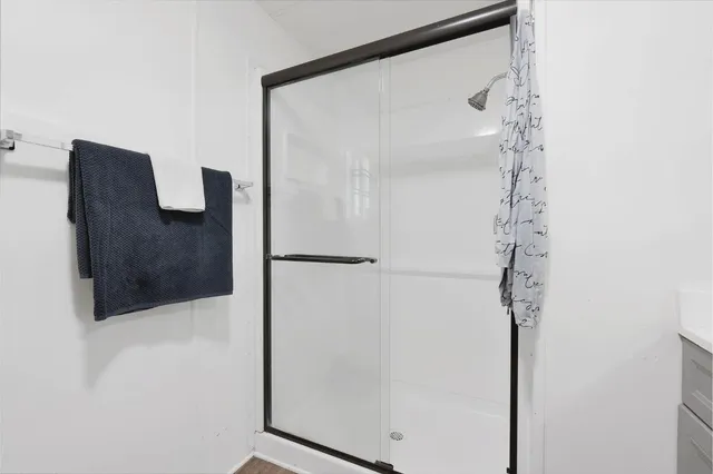 a room with toys and dresser