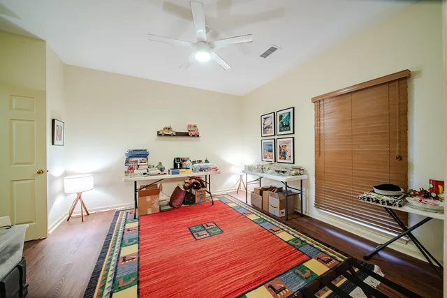 front view of a house with a swimming pool