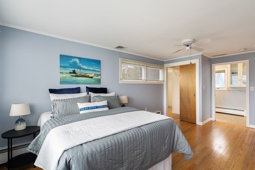 21 Fishermans Cove Road Wareham, MA 02532 - Photo 15 of 34 a bedroom with bed and wooden floor