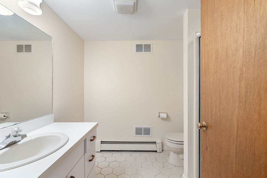21 Fishermans Cove Road Wareham, MA 02532 - Photo 23 of 34 a bathroom with a sink a toilet and shower