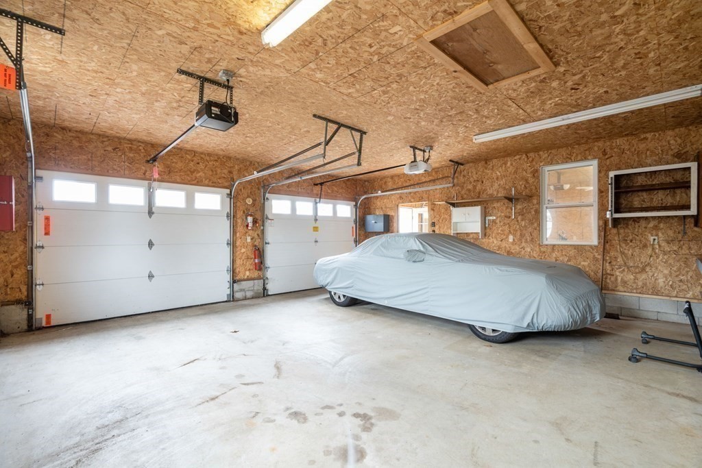 21 Fishermans Cove Road Wareham, MA 02532 - Photo 26 of 34 a bedroom with a bed and a night stand