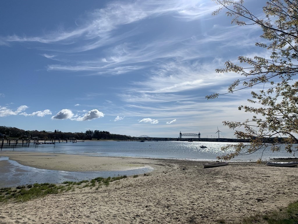 21 Fishermans Cove Road Wareham, MA 02532 - Photo 31 of 34 a view of a lake with an ocean beach