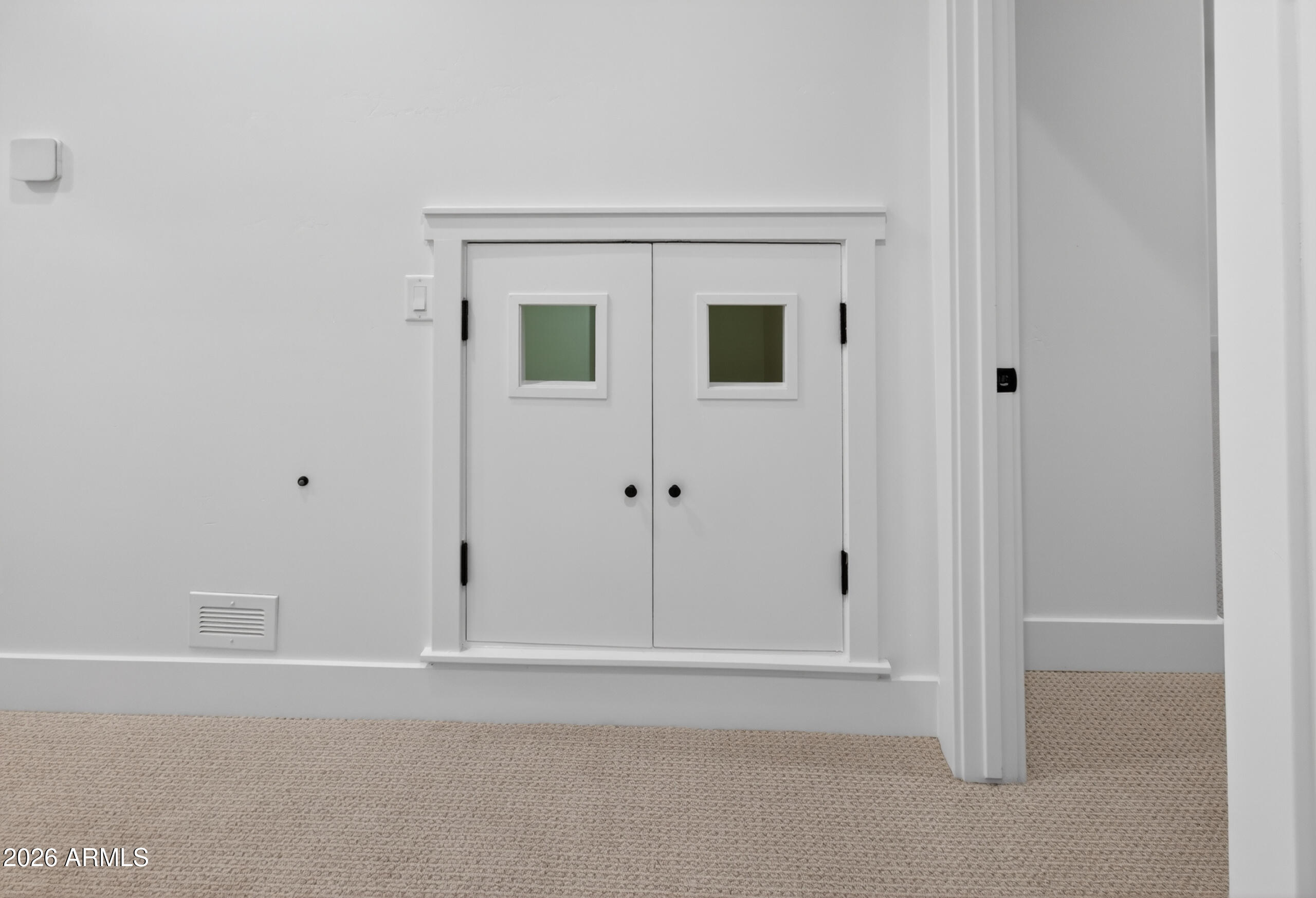 2677 East Queen Creek Road Gilbert, AZ 85297 - Photo 64 of 128 a view of a small space with wooden floor