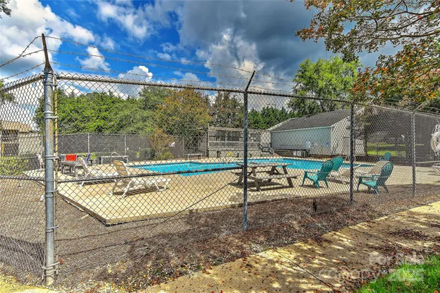 a view of a park with sitting area