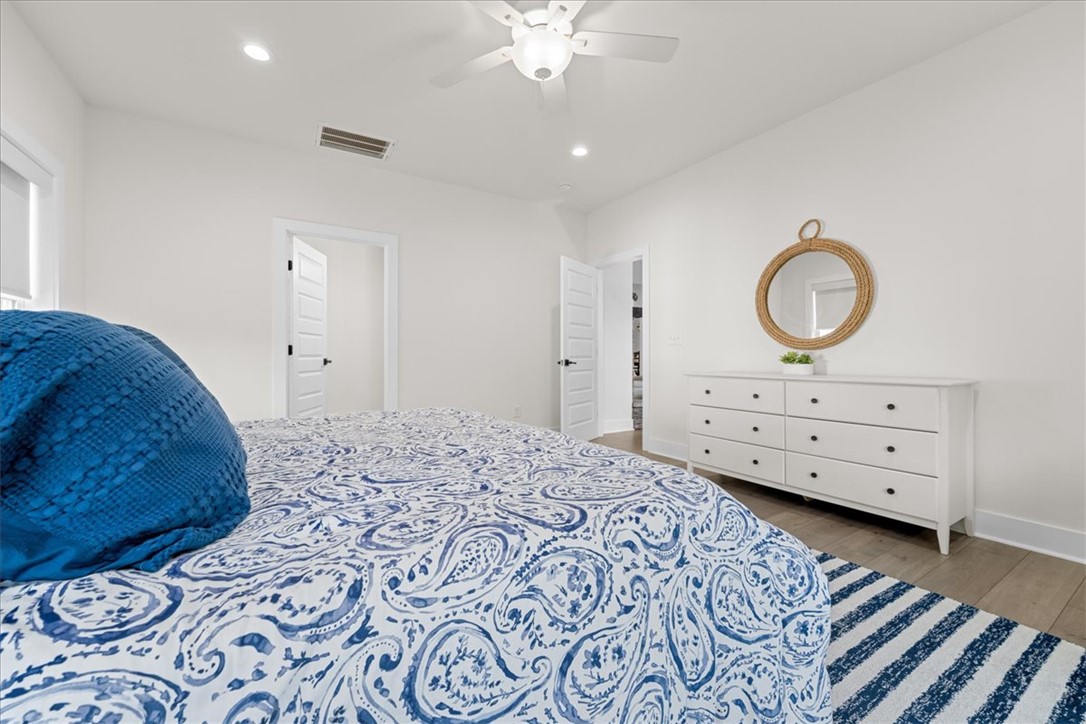 545 Peninsula Road West Union, SC 29696 - Photo 19 of 49 This spacious room features bright recessed lighting and a ceiling fan, offering comfort and style.
