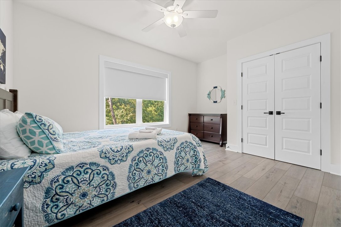 545 Peninsula Road West Union, SC 29696 - Photo 35 of 49 This bright and airy room offers comfortable living with a refreshing view of nature.