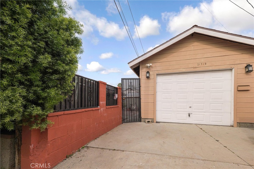 a front view of a house with a garage