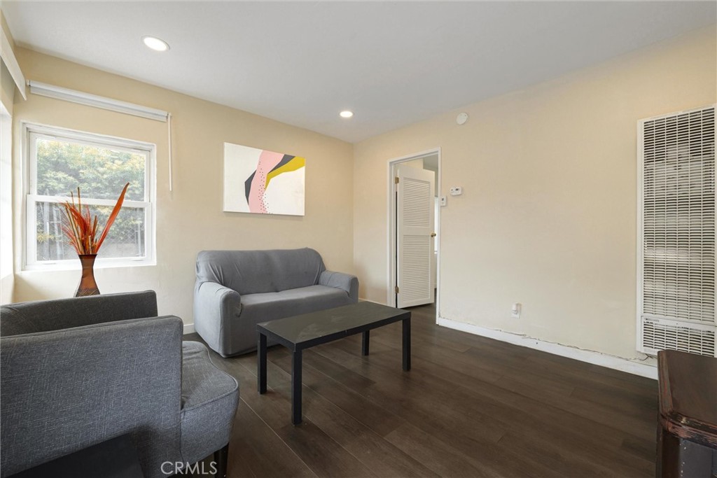 21719 Neptune Avenue Carson, CA 90745 - Photo 4 of 15 a living room with furniture and a window