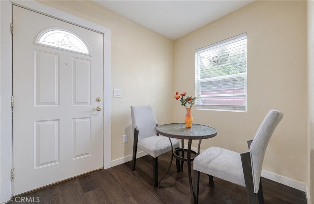 21719 Neptune Avenue Carson, CA 90745 - Photo 8 of 15 a view of a room with furniture and wooden floor