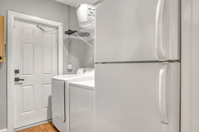 a bedroom with a bed and ceiling fan