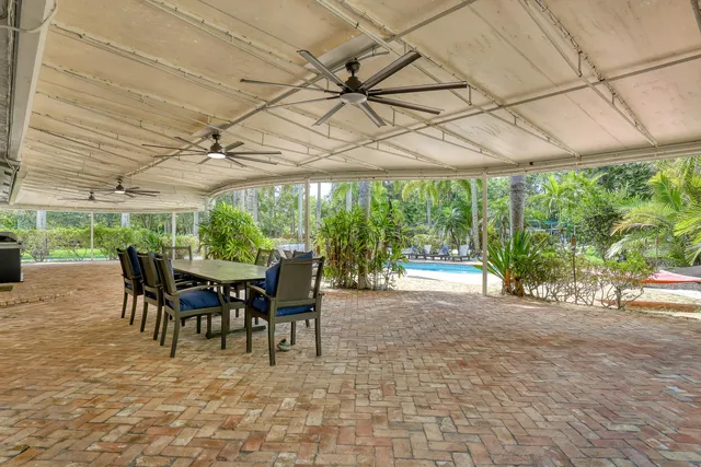 a bathroom with a sink toilet and a mirror
