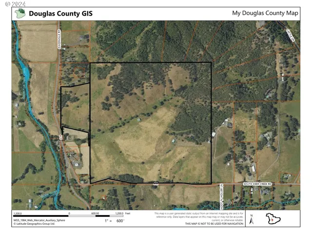 a picture of a bathroom with a shower and a mirror