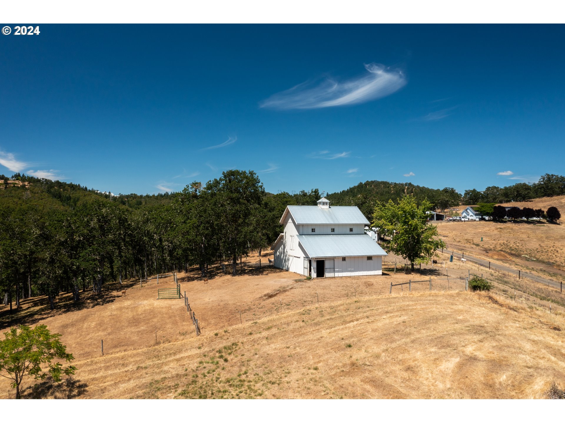 588 South Deer Creek Road Roseburg, OR 97470 - Photo 8 of 45 a view of a terrace with a outdoor space