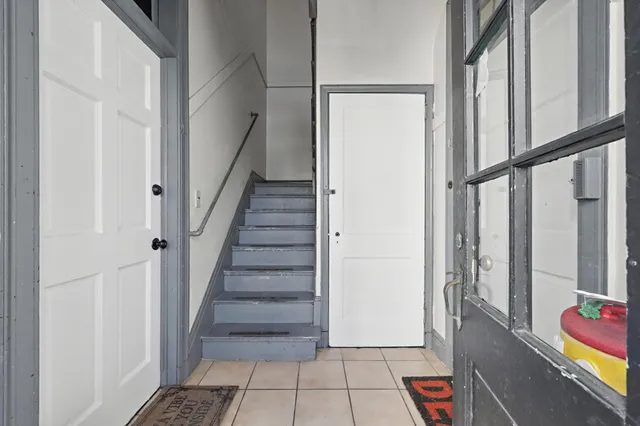 a view of an entryway with stairs