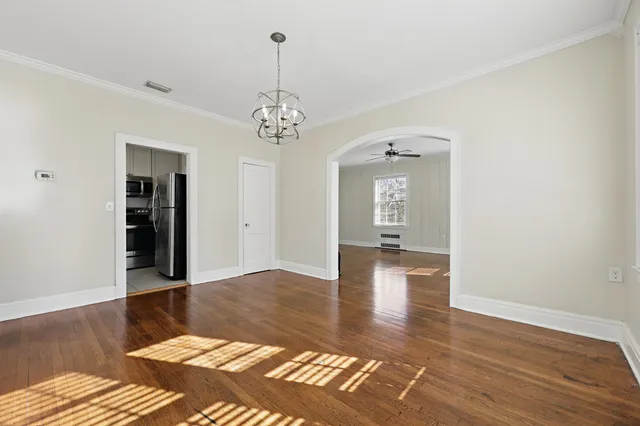 a view of livingroom with kitchen
