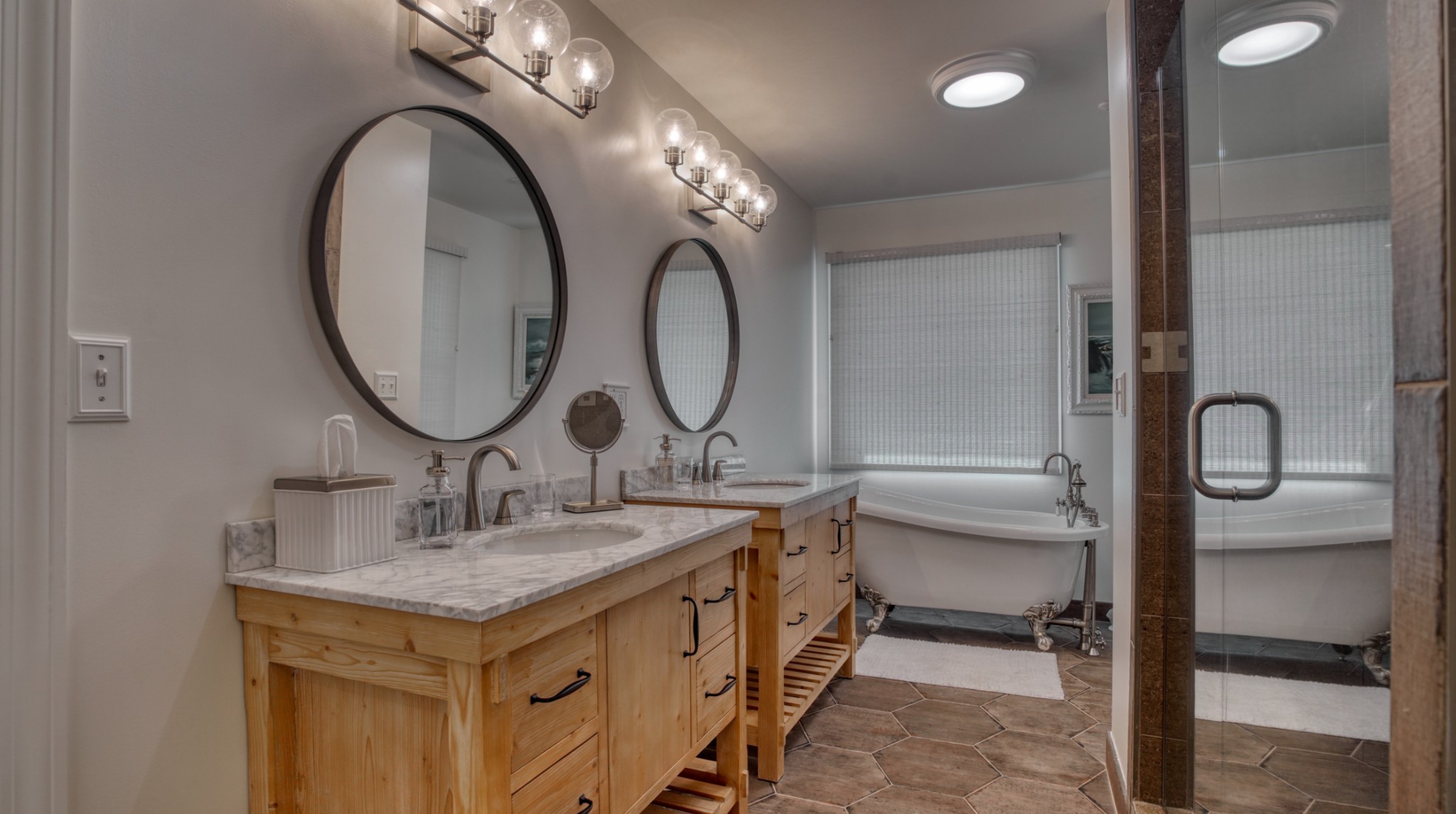 560 Big Spring Hollow Road Pulaski, TN 38478 - Photo 13 of 41 a bathroom with a granite countertop toilet a sink and a mirror