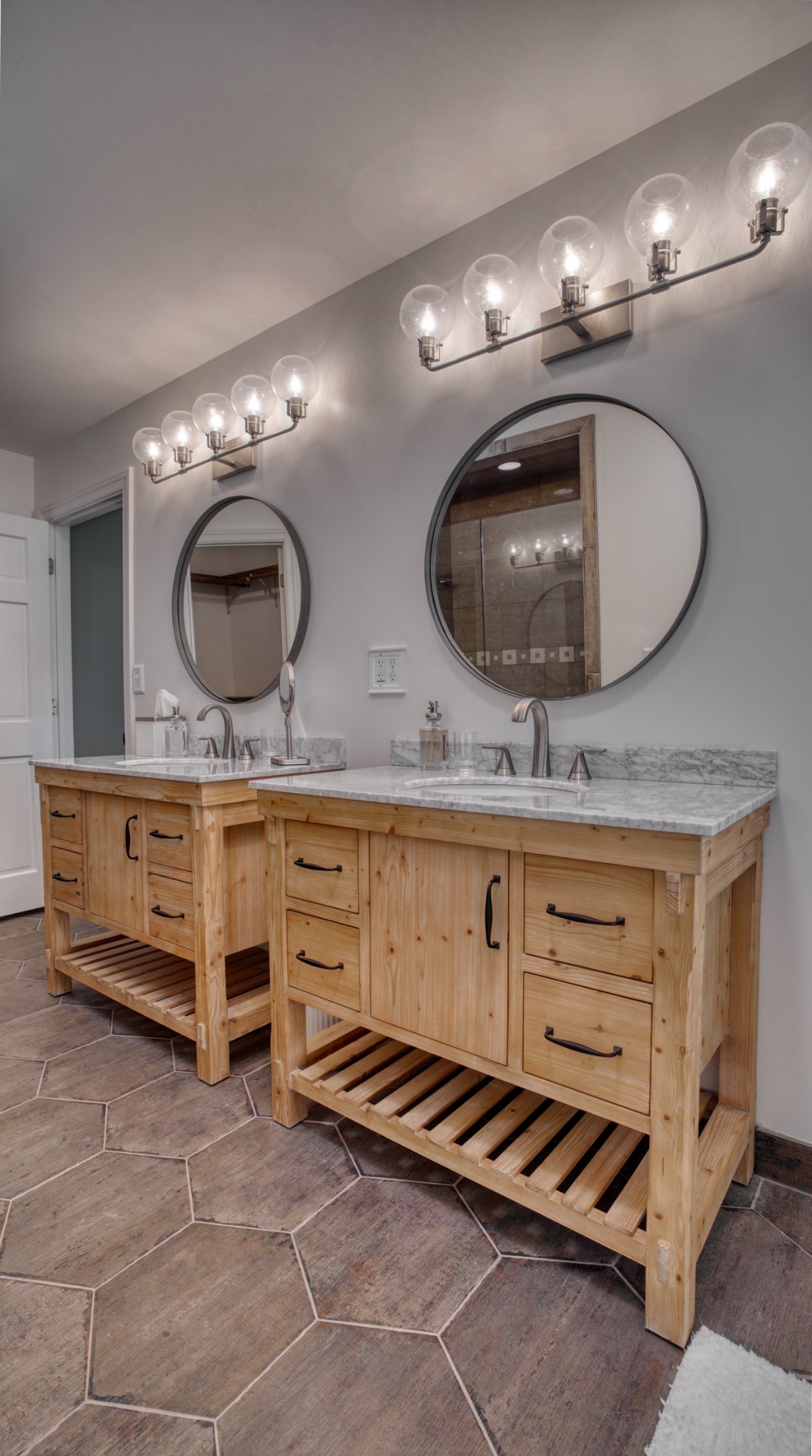 560 Big Spring Hollow Road Pulaski, TN 38478 - Photo 14 of 41 a bathroom with a double vanity sink and a mirror