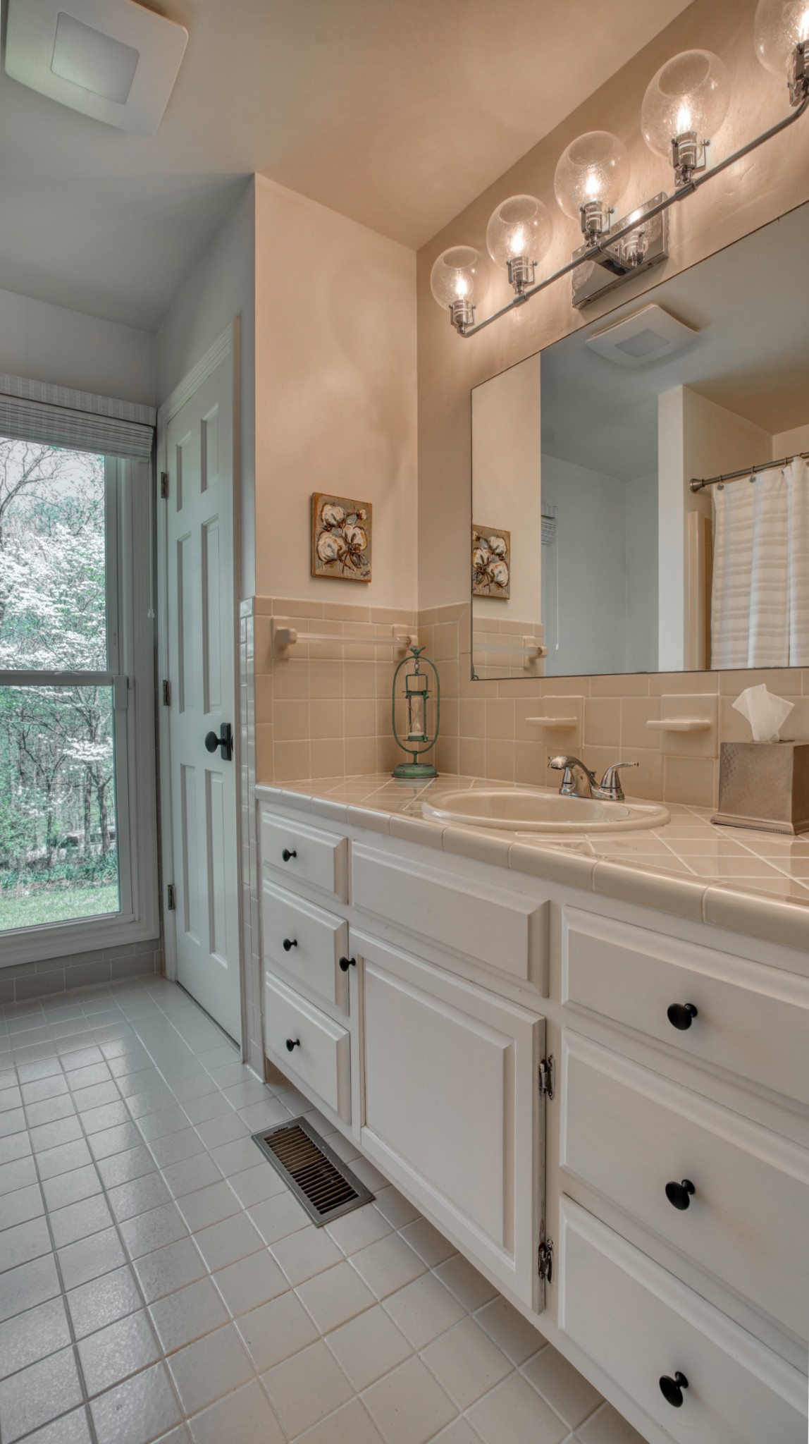 560 Big Spring Hollow Road Pulaski, TN 38478 - Photo 17 of 41 a bathroom with a sink double vanity and a mirror