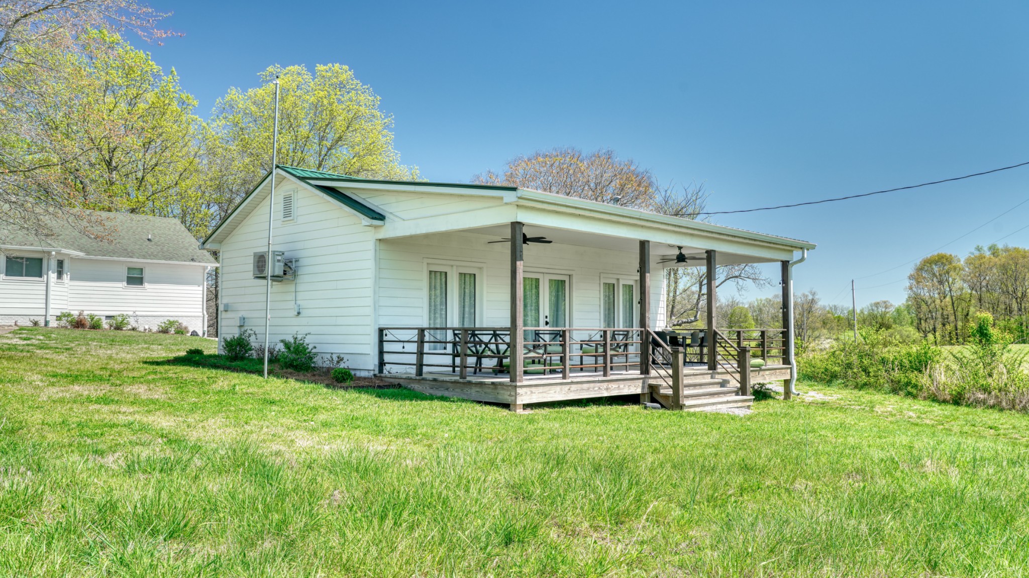 560 Big Spring Hollow Road Pulaski, TN 38478 - Photo 29 of 41 a view of a house with backyard and porch