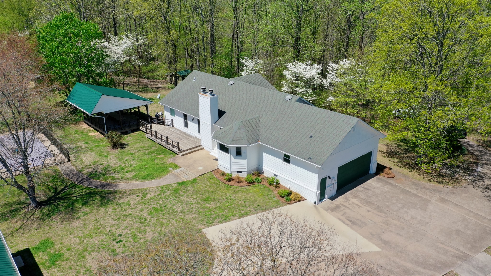 560 Big Spring Hollow Road Pulaski, TN 38478 - Photo 39 of 41 a aerial view of a house with a yard and large trees