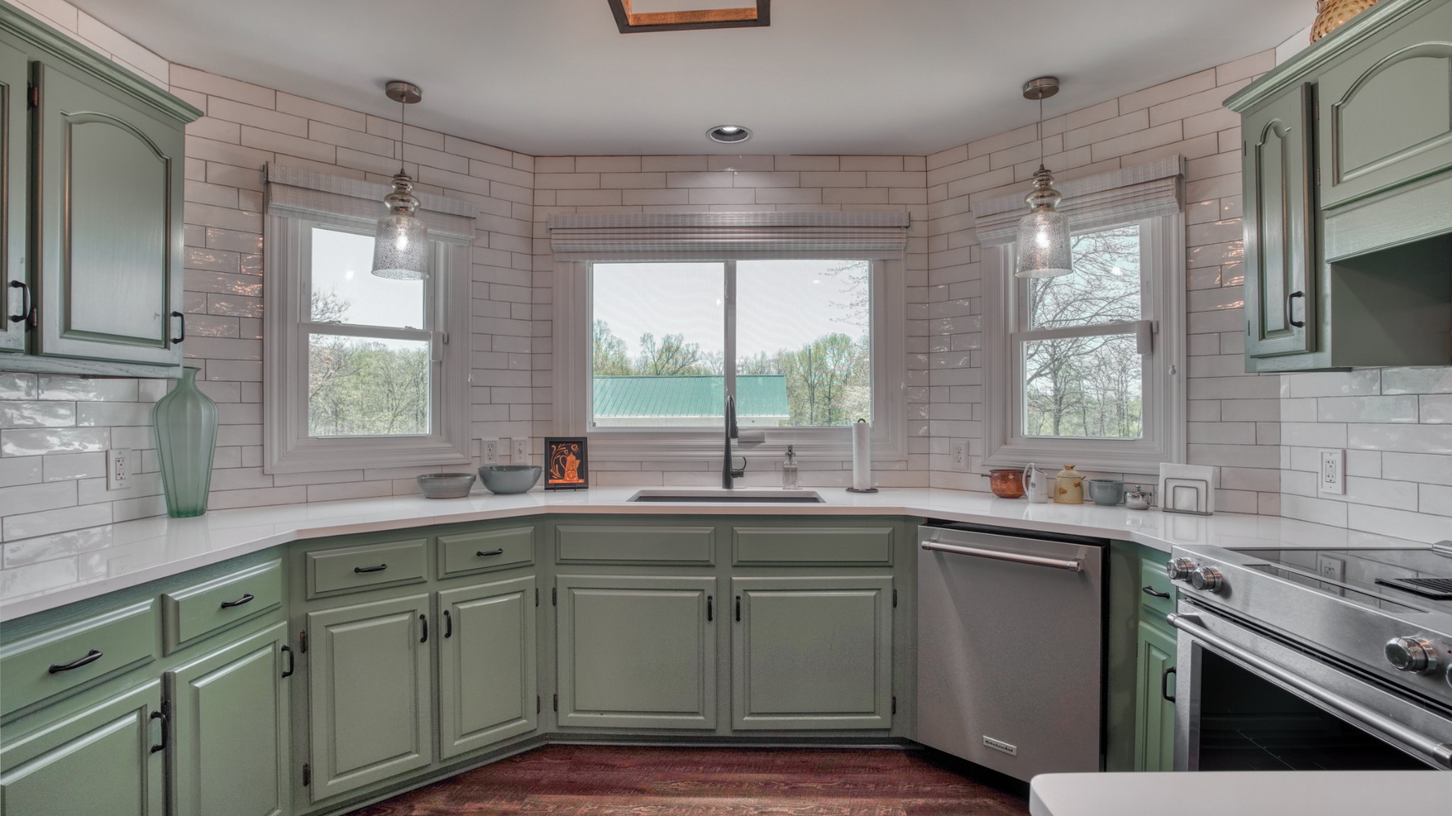 560 Big Spring Hollow Road Pulaski, TN 38478 - Photo 4 of 41 a kitchen with a sink stove and cabinets