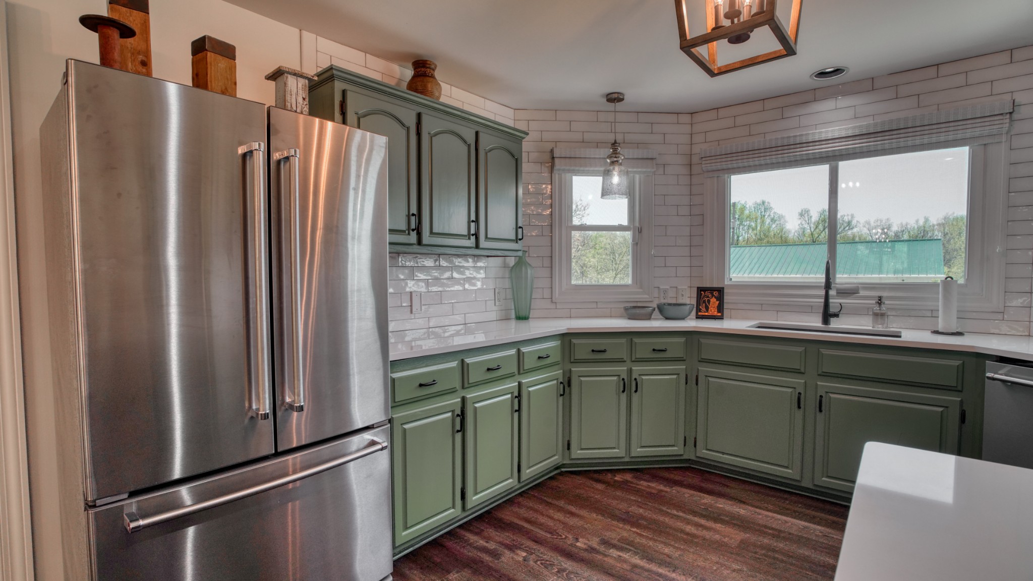560 Big Spring Hollow Road Pulaski, TN 38478 - Photo 6 of 41 a kitchen with stainless steel appliances granite countertop a refrigerator and a sink