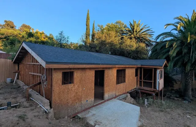 a house view with a garden space