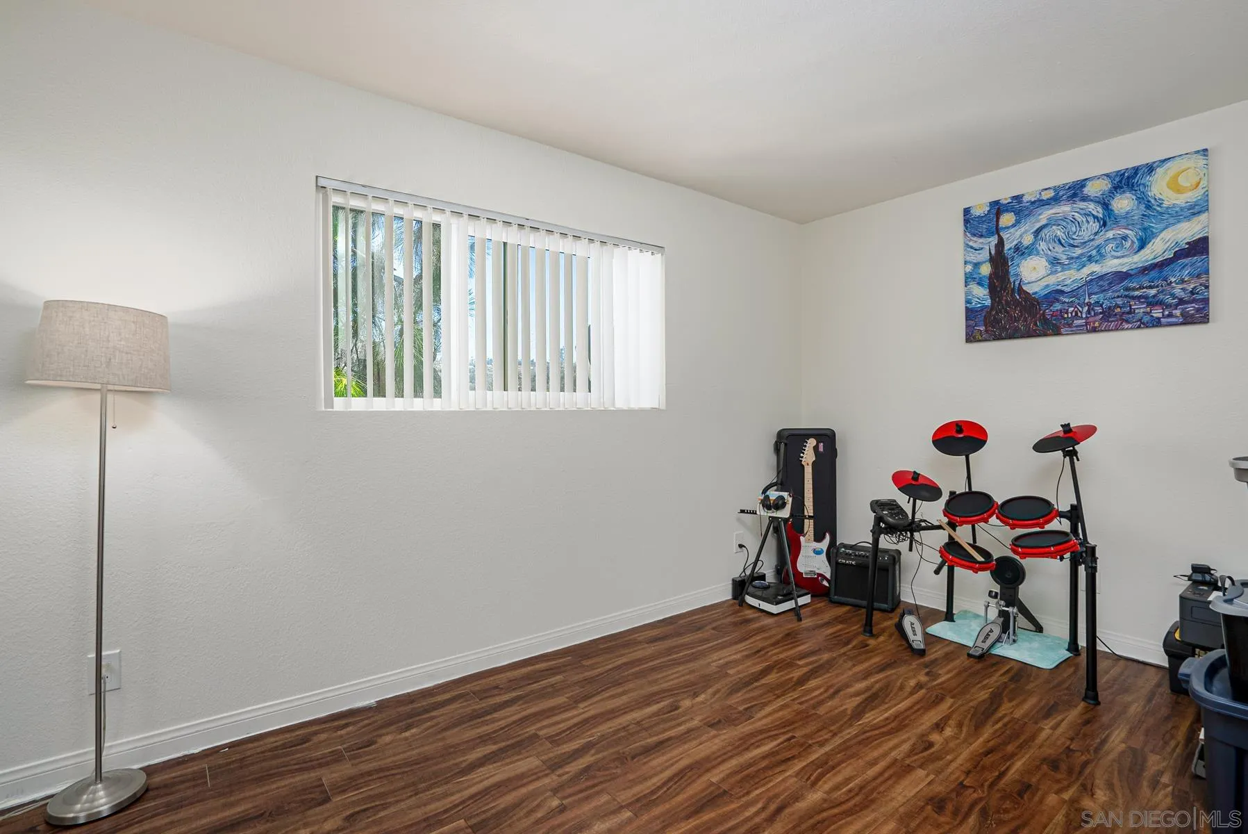 9860 Dale Avenue, Unit D7 Spring Valley, CA 91977 - Photo 11 of 19 a view of a room with wooden floor and a window