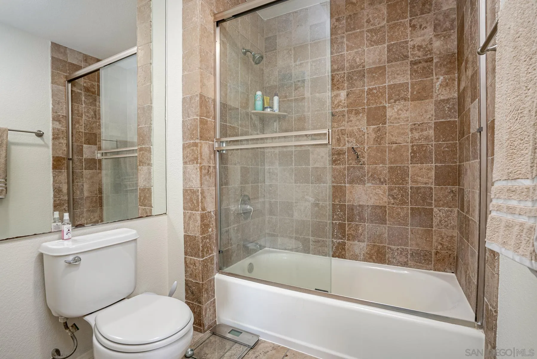 9860 Dale Avenue, Unit D7 Spring Valley, CA 91977 - Photo 15 of 19 a bathroom with a bathtub and toilet