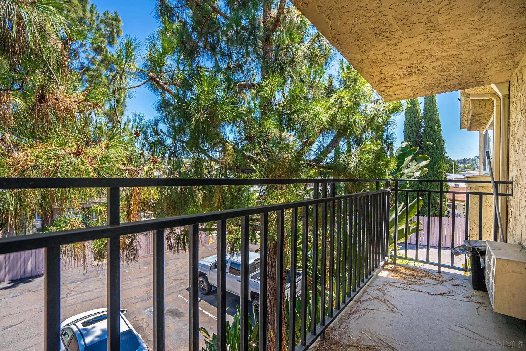 9860 Dale Avenue, Unit D7 Spring Valley, CA 91977 - Photo 16 of 19 a view of a balcony with a tree