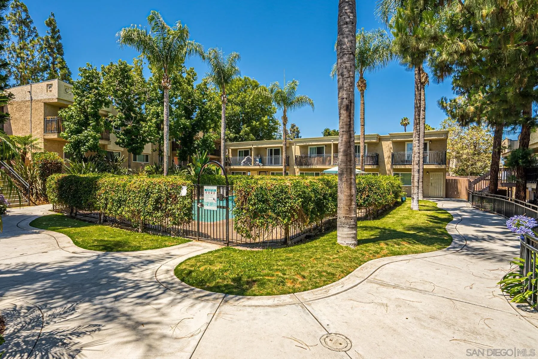 9860 Dale Avenue, Unit D7 Spring Valley, CA 91977 - Photo 18 of 19 a view of a chair and table in the garden