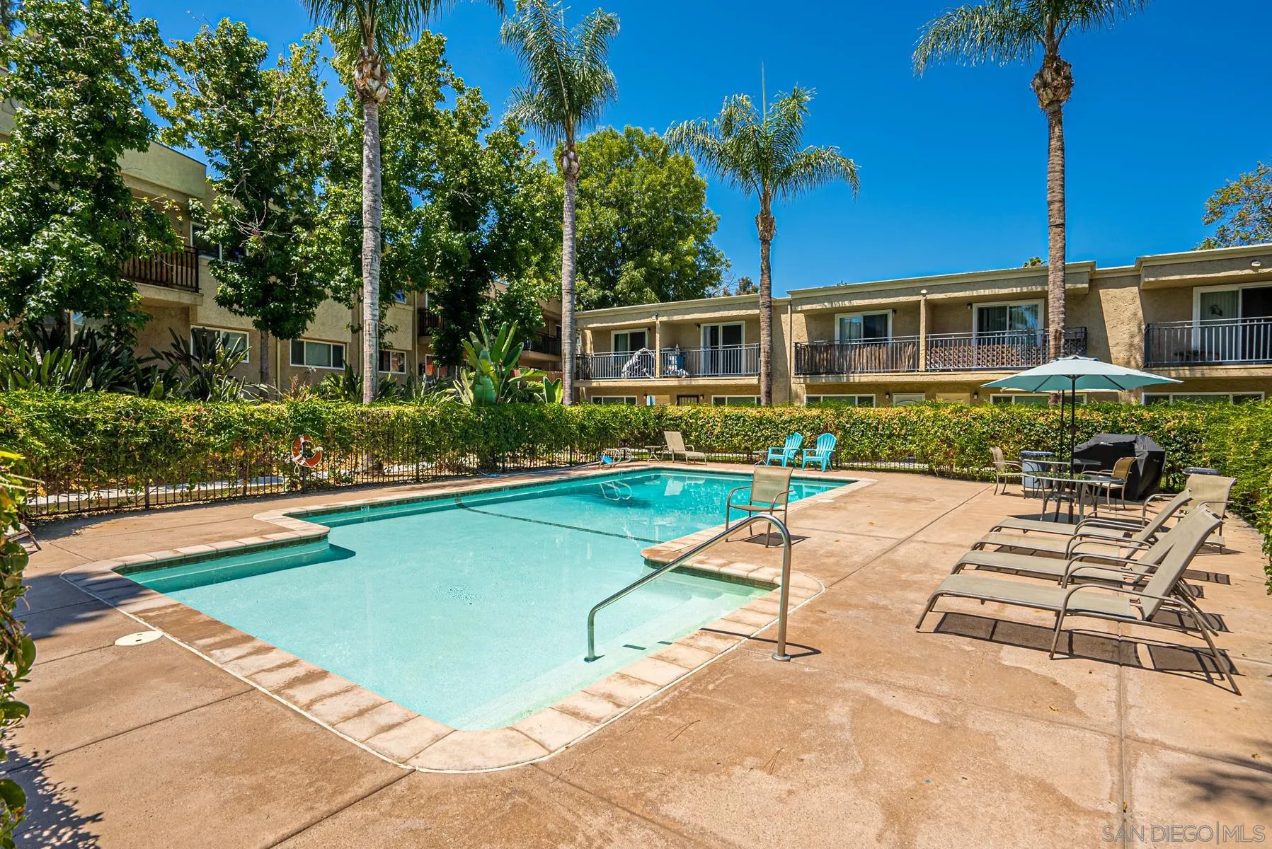 9860 Dale Avenue, Unit D7 Spring Valley, CA 91977 - Photo 19 of 19 a view of house with swimming pool outdoor seating