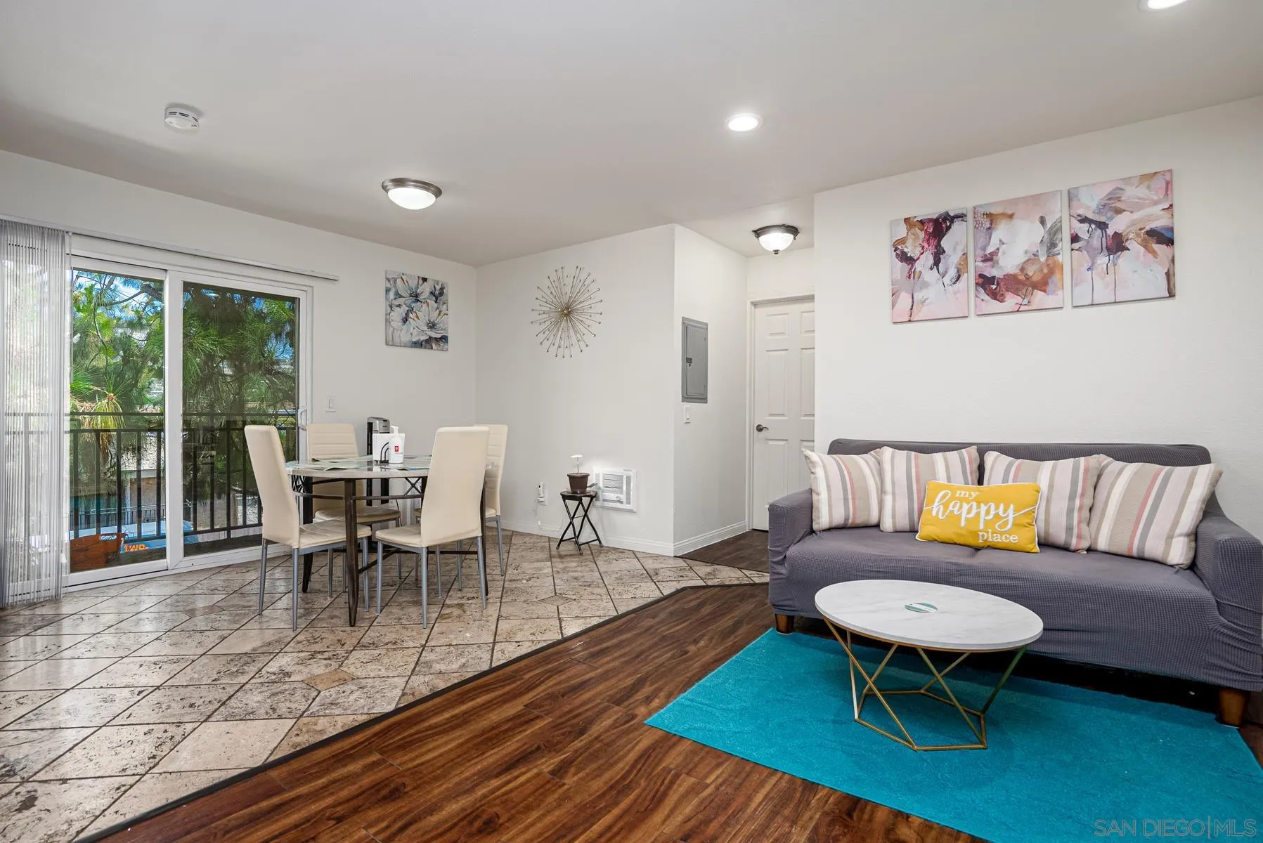 9860 Dale Avenue, Unit D7 Spring Valley, CA 91977 - Photo 4 of 19 a living room with furniture a rug and a large window