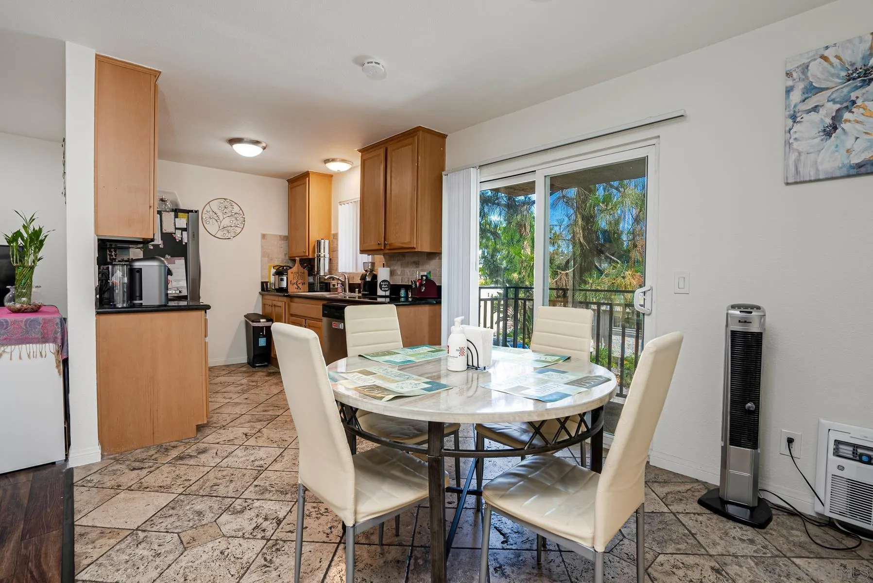 9860 Dale Avenue, Unit D7 Spring Valley, CA 91977 - Photo 6 of 19 a view of a dining room with furniture window and outside view