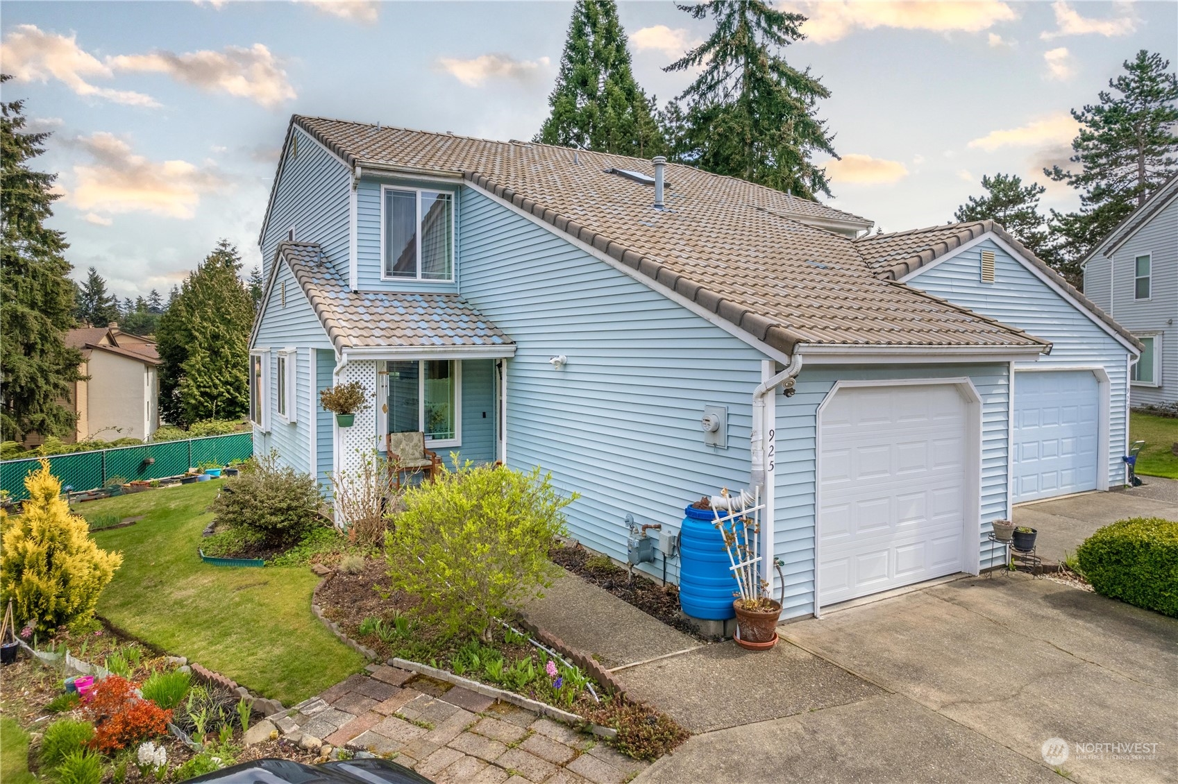 925 South 310th Place Federal Way, WA 98003 - Photo 1 of 39 a view of a house with backyard
