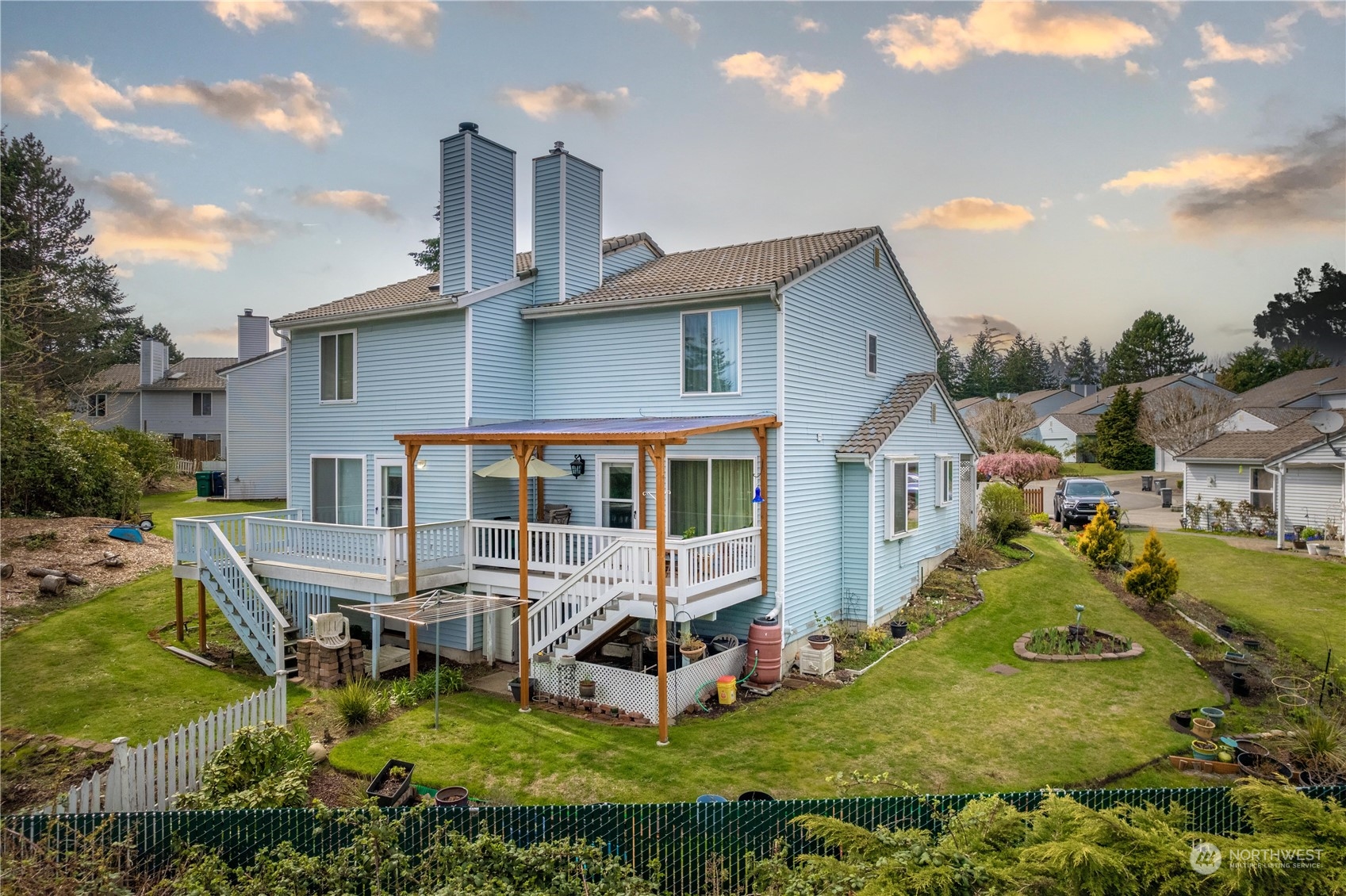 925 South 310th Place Federal Way, WA 98003 - Photo 5 of 39 a view of a house with backyard porch and sitting area