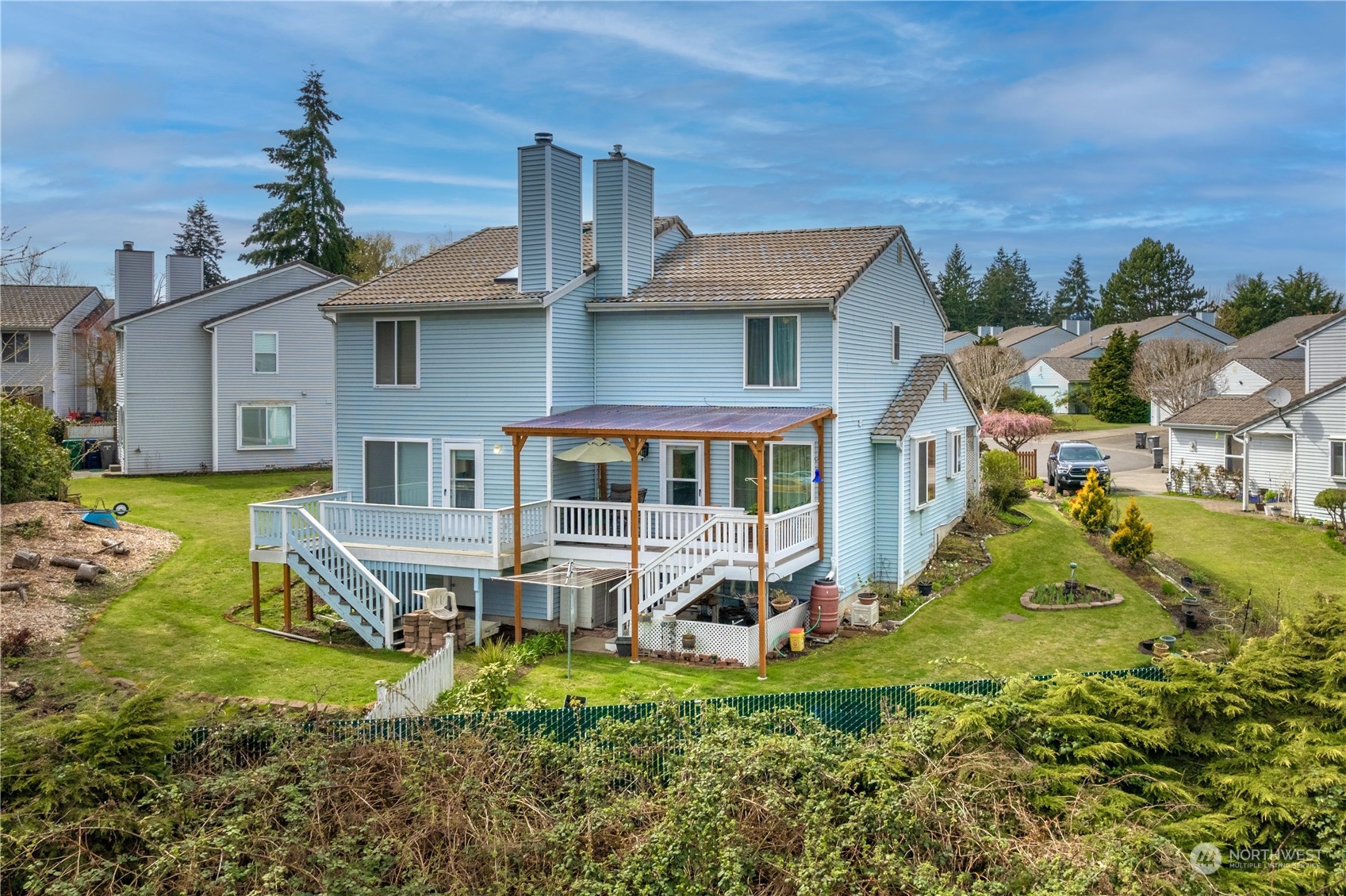 925 South 310th Place Federal Way, WA 98003 - Photo 10 of 39 a view of a house with a yard