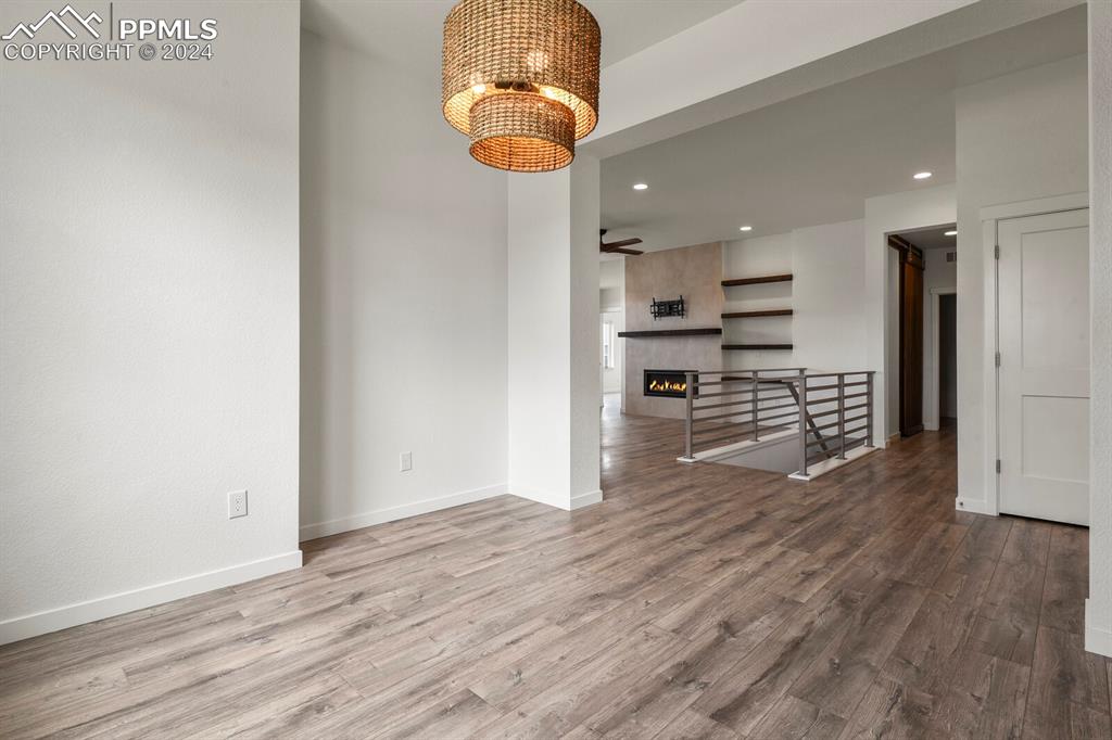 1094 Rambling Oak Drive Monument, CO 80132 - Photo 17 of 44 a view of a kitchen with wooden floor
