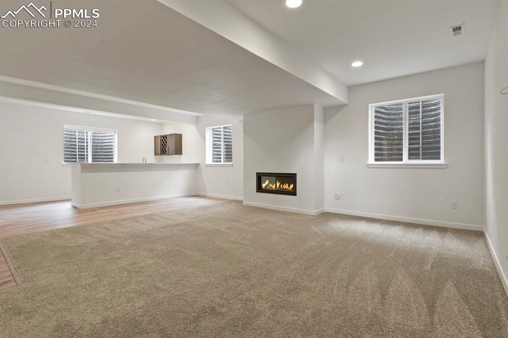 1094 Rambling Oak Drive Monument, CO 80132 - Photo 32 of 44 a view of an empty room with a window