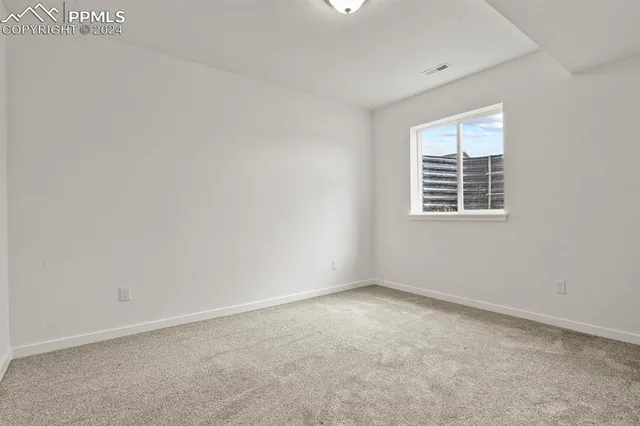 an empty room with a window