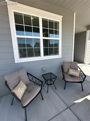a view of a two chairs in a room