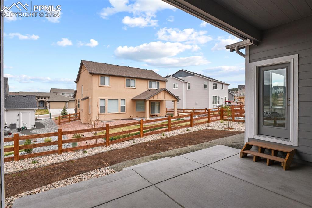 1094 Rambling Oak Drive Monument, CO 80132 - Photo 43 of 44 a view of a house with a street