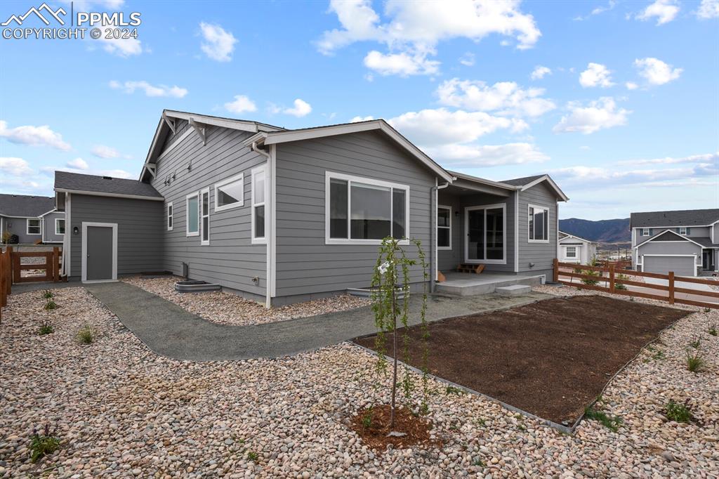1094 Rambling Oak Drive Monument, CO 80132 - Photo 44 of 44 a view of a house with backyard