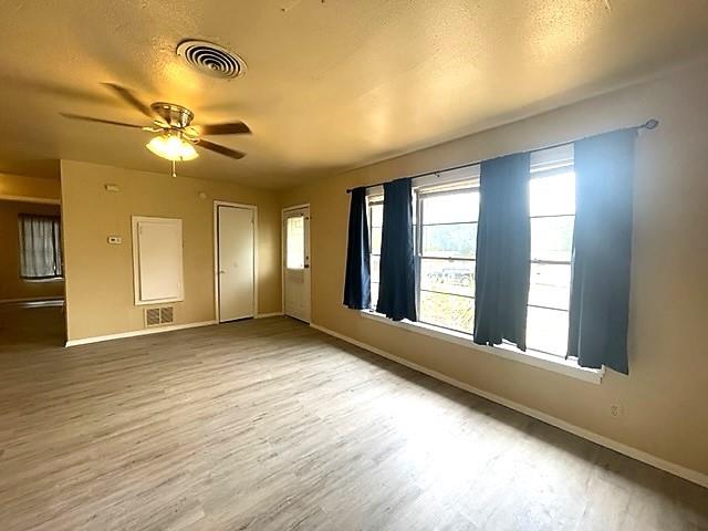 10 Pershing Drive, Unit A Denison, TX 75020 - Photo 5 of 13 a view of an empty room with a window