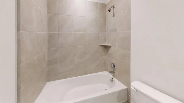 a bathroom with a bathtub