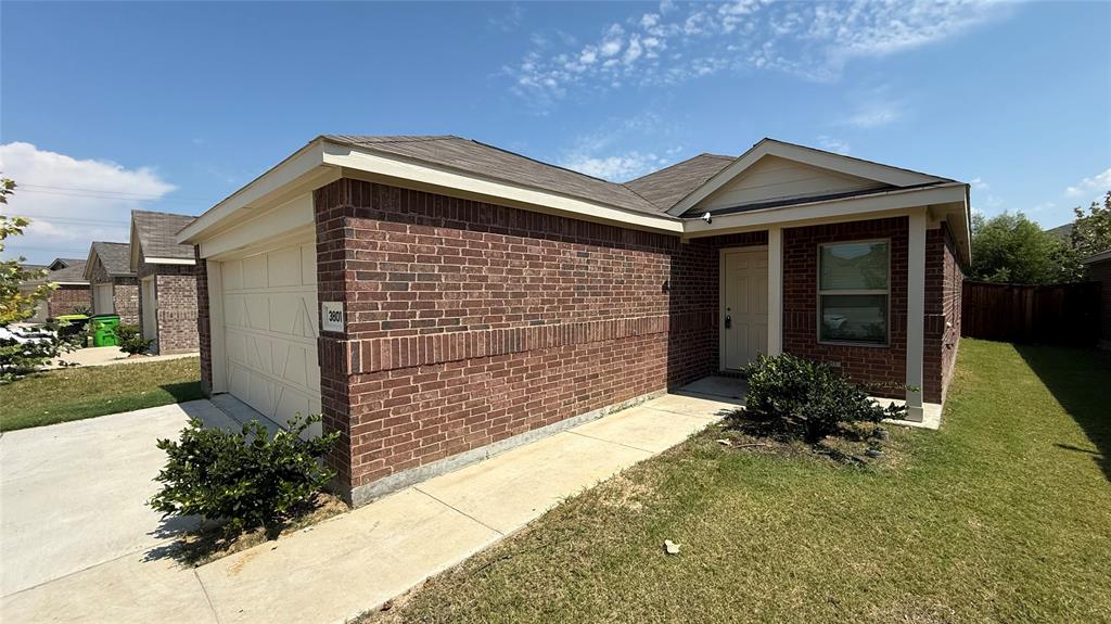 3801 Harper Street Little Elm, TX 75068 - Photo 3 of 17 a front view of a house with a yard
