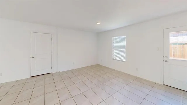 a view of an empty room and window