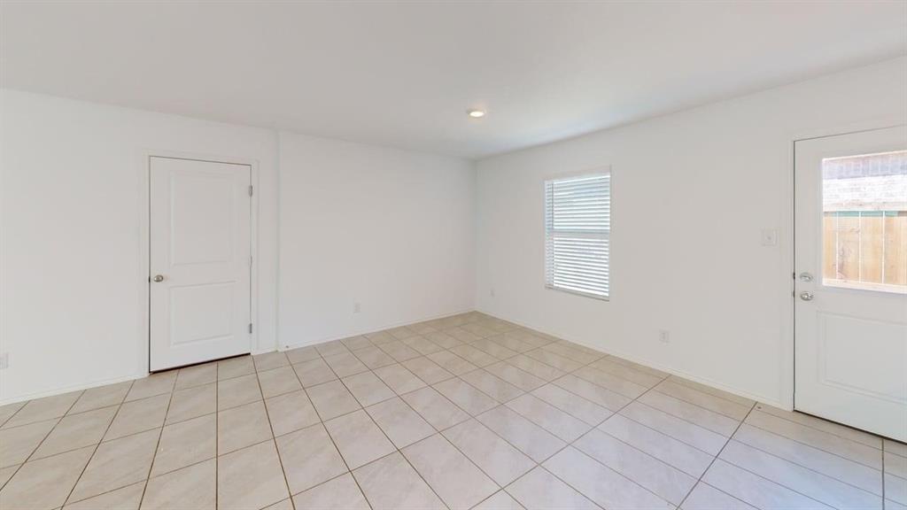 3801 Harper Street Little Elm, TX 75068 - Photo 8 of 17 a view of an empty room and window