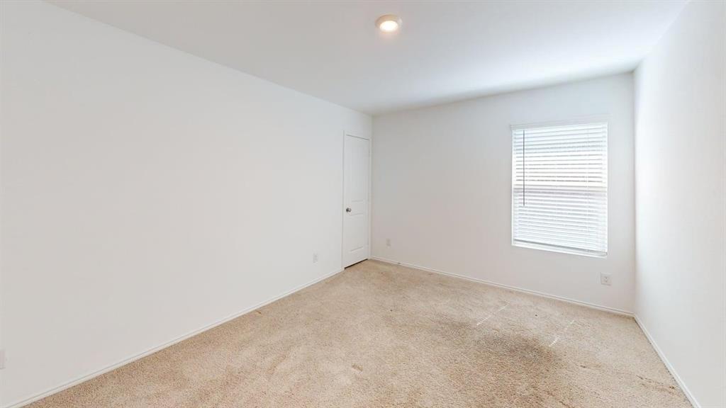 3801 Harper Street Little Elm, TX 75068 - Photo 10 of 17 an empty room with a window
