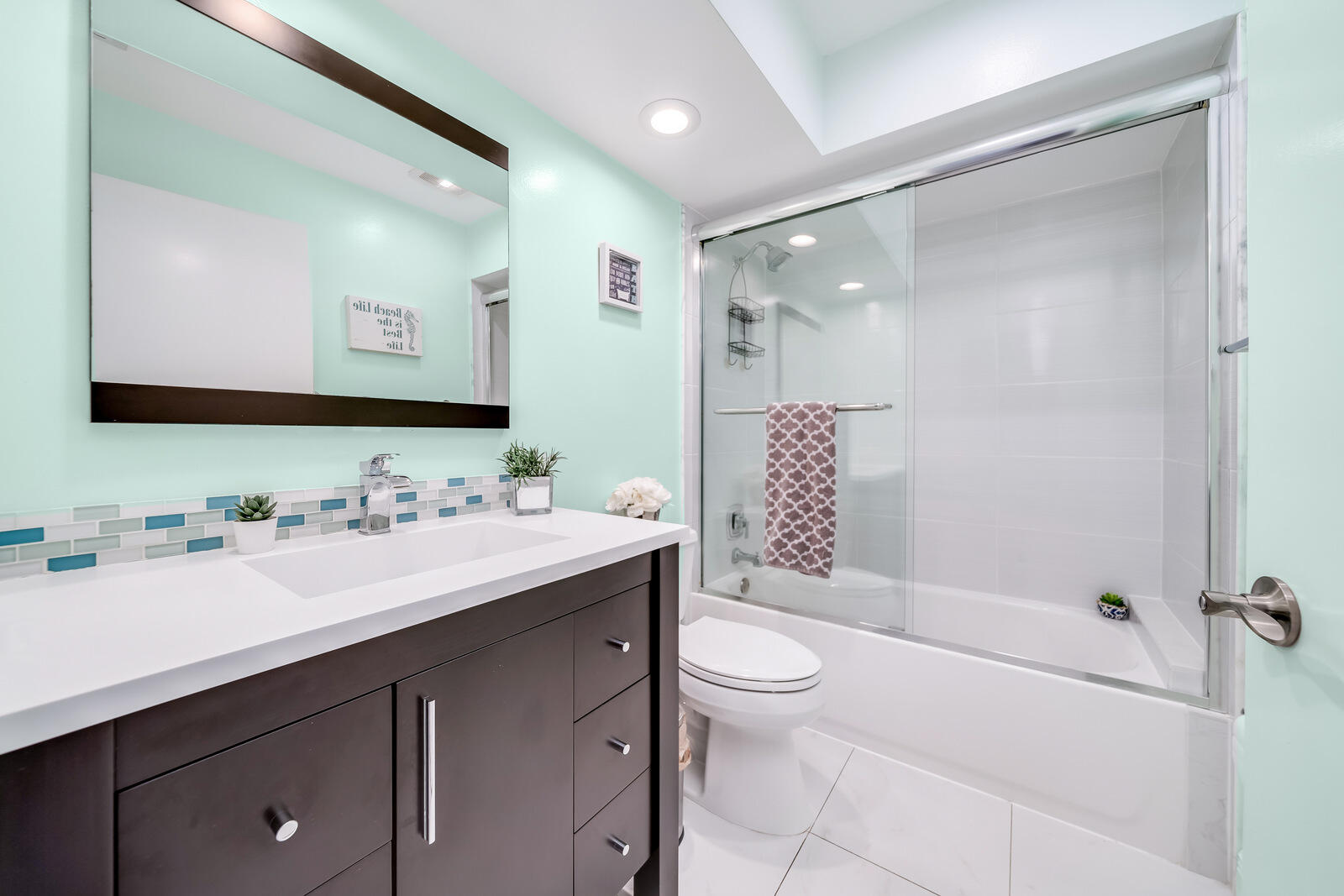 23250 Sedawie Drive Boca Raton, FL 33433 - Photo 29 of 42 a bathroom with a sink a toilet and shower